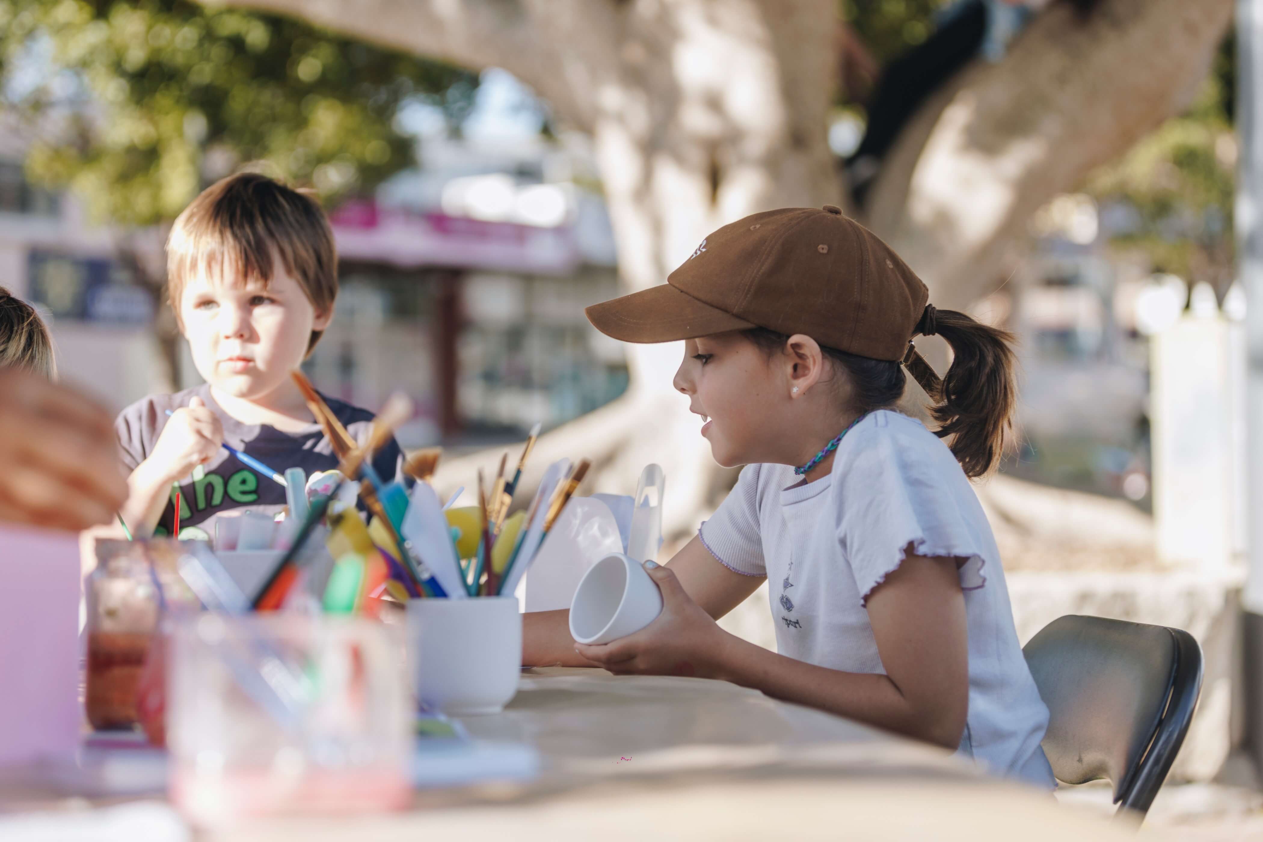 Kids sitting at craft table